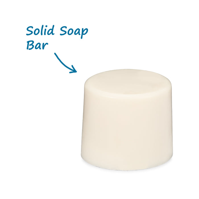 A photo of package-free Meliora Dish Soap with an arrow pointing to the solid soap bar.