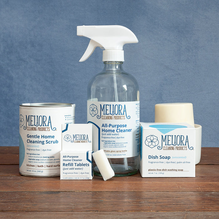 A photo of the Home Cleaning Collection from Meliora Cleaning Products featuring Gentle Home Cleaning Scrub (cleaning powder), All-Purpose Home Cleaner, and Dish Soap.